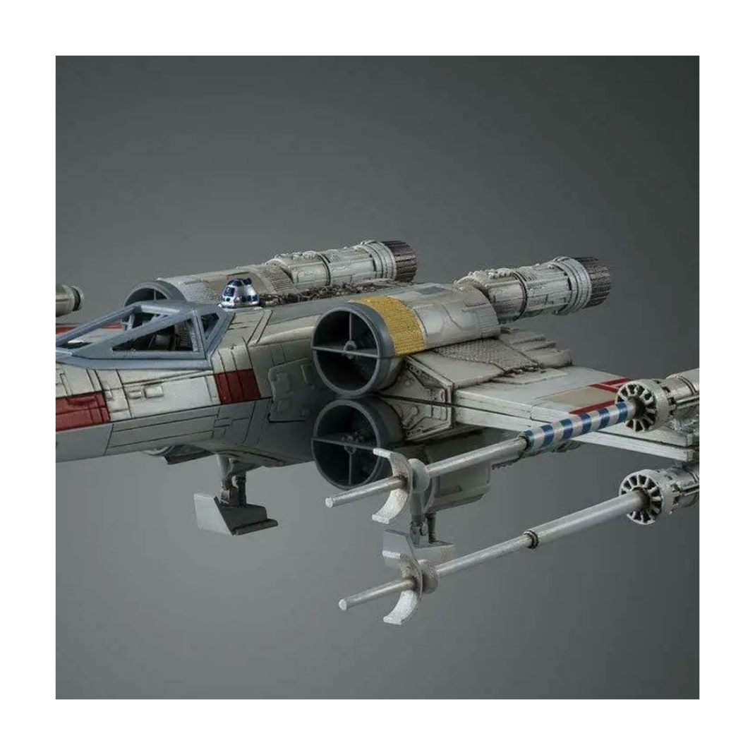 Bandai 1/72 scale Star Wars X-Wing Starfighter plastic model kit box art, showing the Rebel starfighter in flight with S-foils open over the Death Star surface.