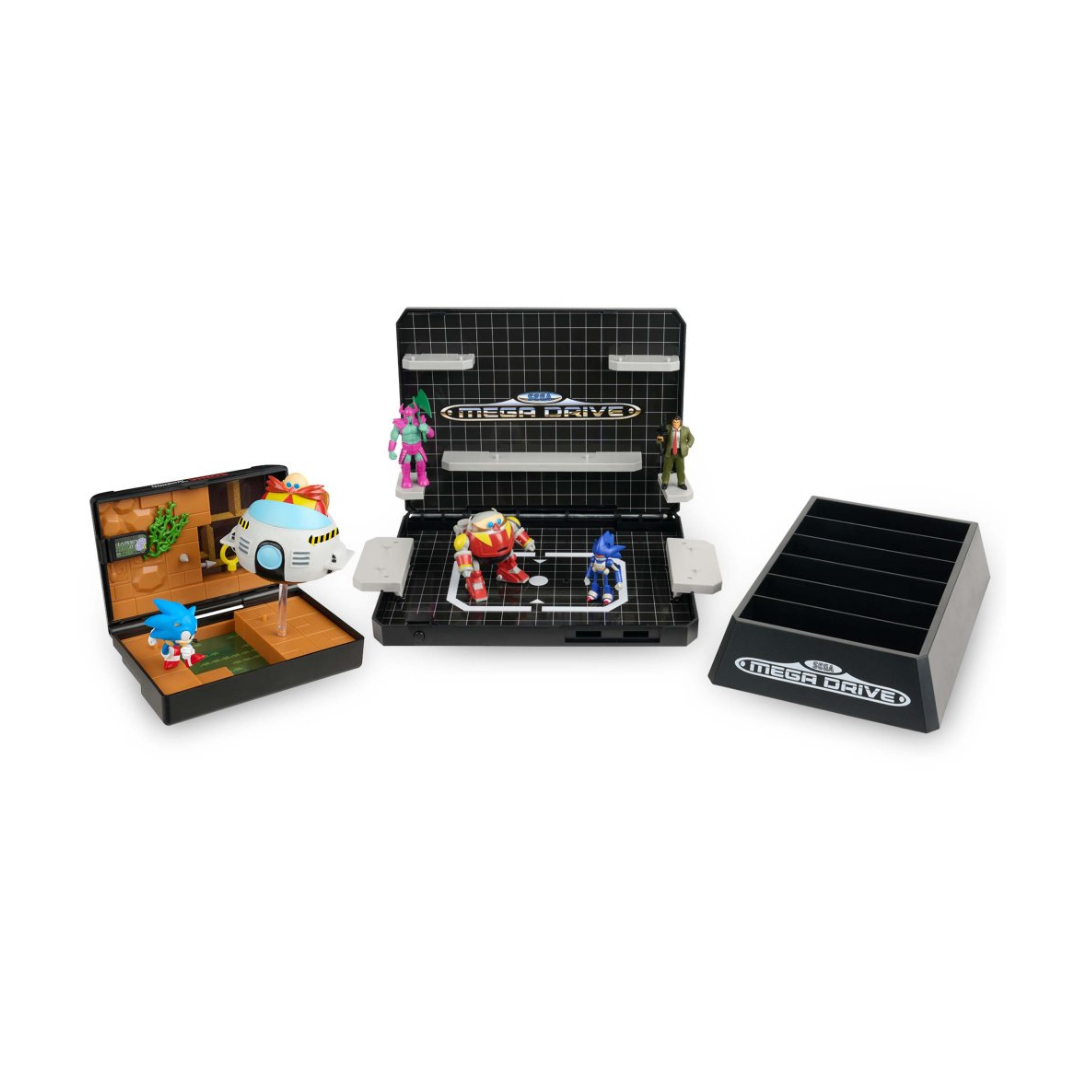 Console Heroes: Sega Mega Drive Display Console Supervillain Boss Bundle, shown open to display the included figures (Mecha Sonic, Mecha Robotnik, Mr. X, Death Bringer) and the exclusive Sonic the Hedgehog 1 diorama cartridge.