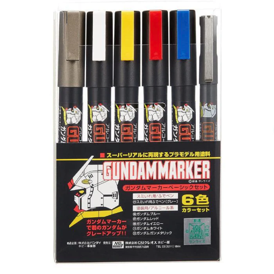 A pack of six Gundam Marker Basic Set (GMS105) markers featuring red, blue, yellow, white, gun metallic, and a gray panel liner.
