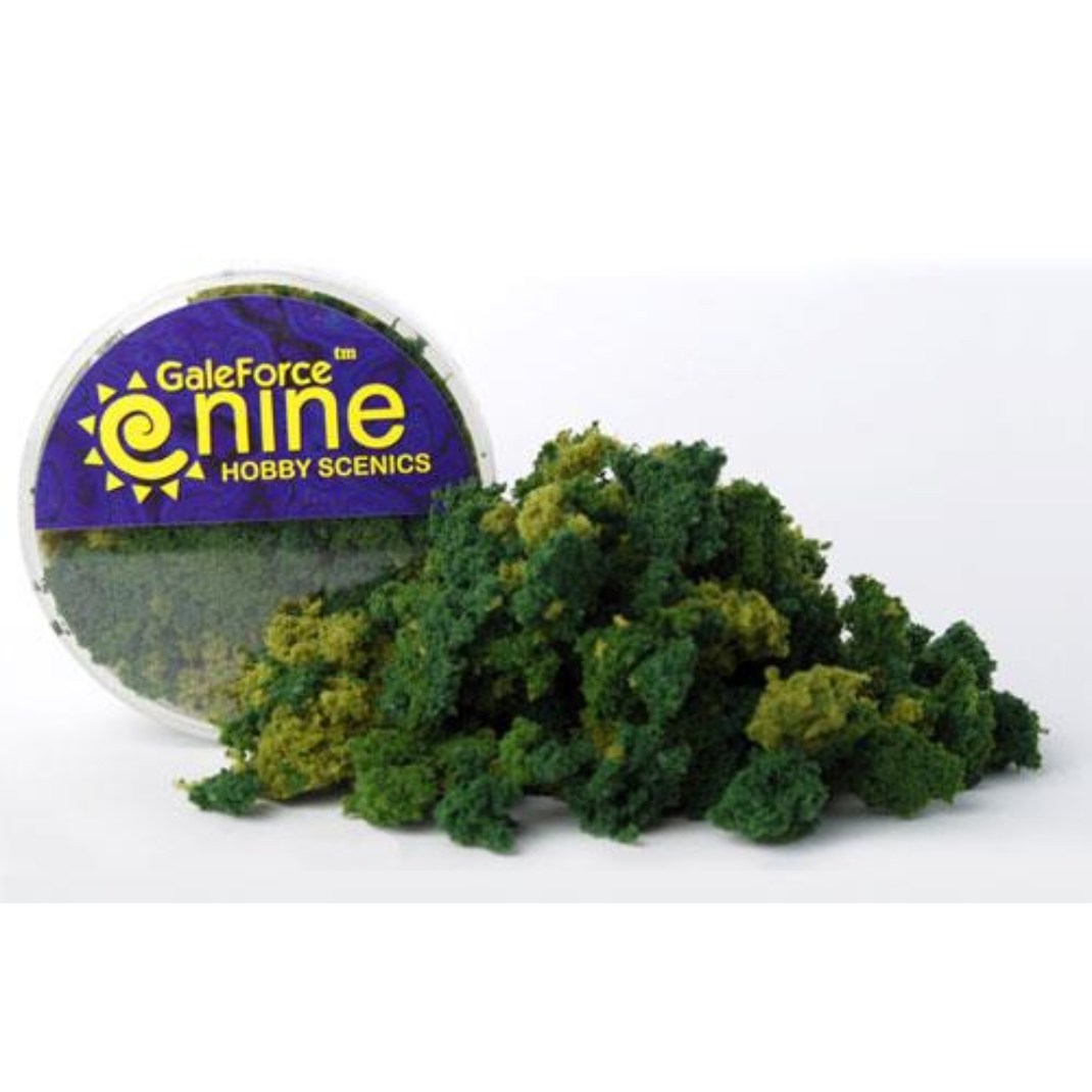 A transparent round container of Gale Force Nine Summer 3 Color Clump Foliage Mix showing a variety of light and dark green textured foam clusters.