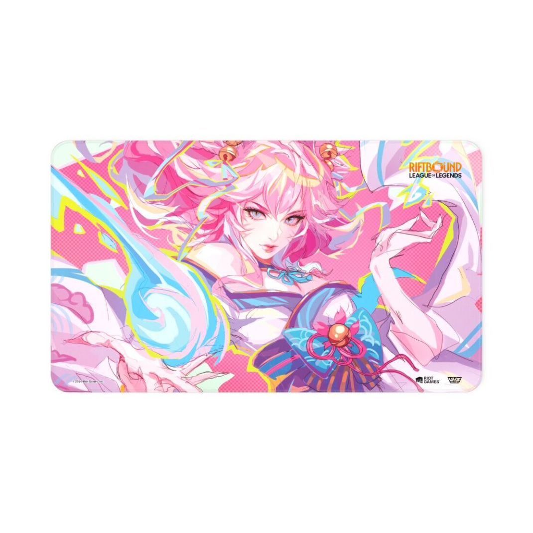 The official Riftbound: League of Legends TCG Spiritforged playmat featuring Spirit Blossom Ahri with pink ethereal tails and a bound stitched edge.