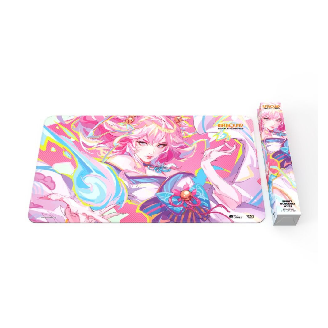 The official Riftbound: League of Legends TCG Spiritforged playmat featuring Spirit Blossom Ahri with pink ethereal tails and a bound stitched edge.
