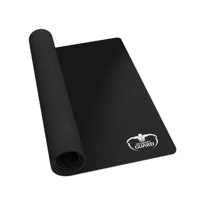“Ultimate Guard Monochrome Black TCG playmat lying flat on a tabletop, showing its smooth black fabric surface and anti-slip rubber backing (61 × 35 cm) — ideal for Magic, Pokémon and other card games.”