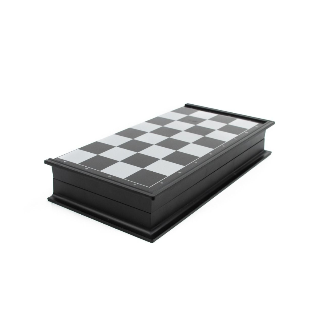 A 20cm LPG Classics plastic magnetic travel chess set shown partially folded, revealing the internal storage for the black and white magnetic pieces.