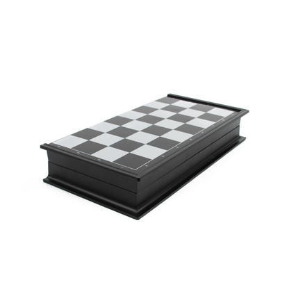 A 20cm LPG Classics plastic magnetic travel chess set shown partially folded, revealing the internal storage for the black and white magnetic pieces.