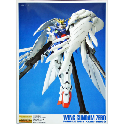 Bandai Master Grade 1/100 scale Wing Gundam Zero Custom model kit showing the white mobile suit with four large angelic wings and twin buster rifles.