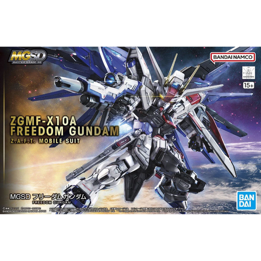 The Bandai MGSD Freedom Gundam model kit with wings fully expanded and all beam cannons deployed in Full Burst Mode.
