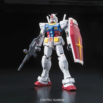 The Bandai RG 1/144 RX-78-2 Gundam Ver.2.0 model kit in a dynamic firing pose, showing the intricate mechanical detail of its new internal frame.
