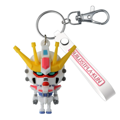 The Buildstpla-kun 3D Rubber Mascot Keychain (G5072016) showing the cute Gunpla mascot in a 3D rubberized design with a metal ball-chain.