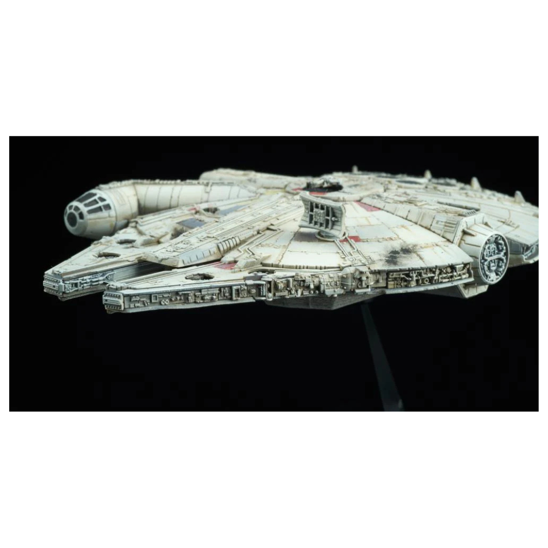 Bandai Star Wars Vehicle Model 006 Millennium Falcon plastic model kit, showing the iconic YT-1300 freighter with a circular radar dish on its black display stand.