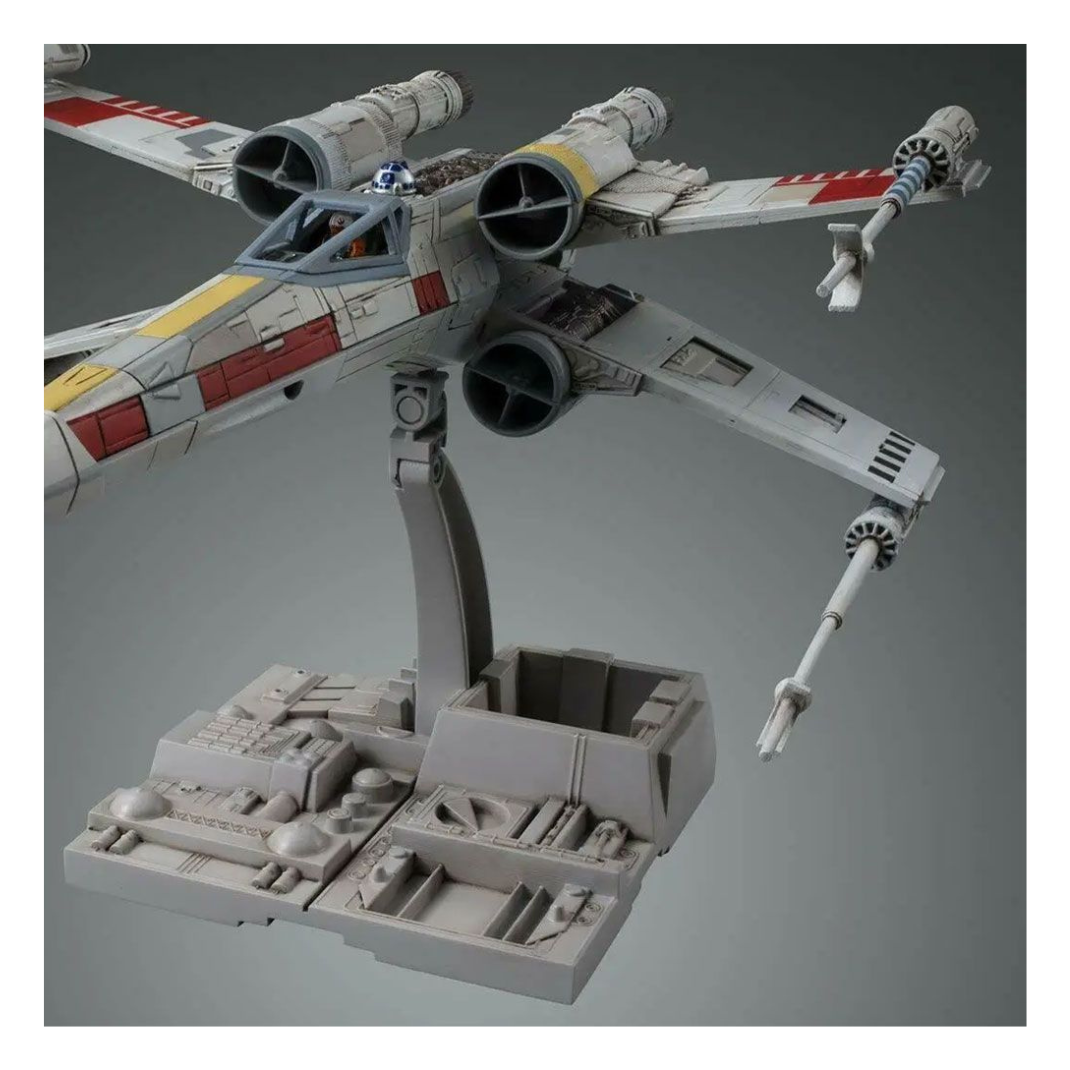 Bandai 1/72 scale Star Wars X-Wing Starfighter plastic model kit box art, showing the Rebel starfighter in flight with S-foils open over the Death Star surface.