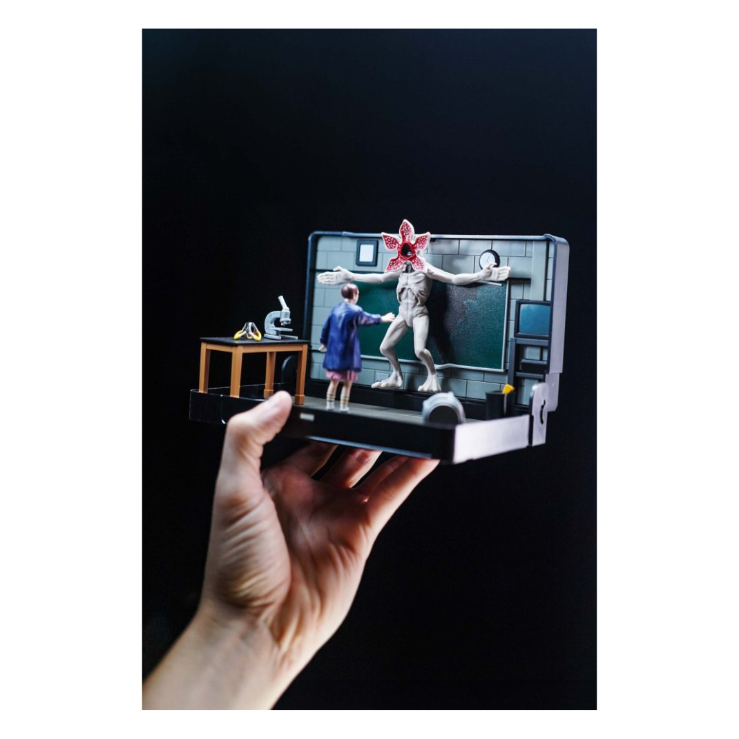 Console Heroes Stranger Things VHS Diorama: Eleven vs. Demogorgon. The collectible is encased in a plastic VHS tape shell, revealing a detailed miniature diorama scene inside the cassette.