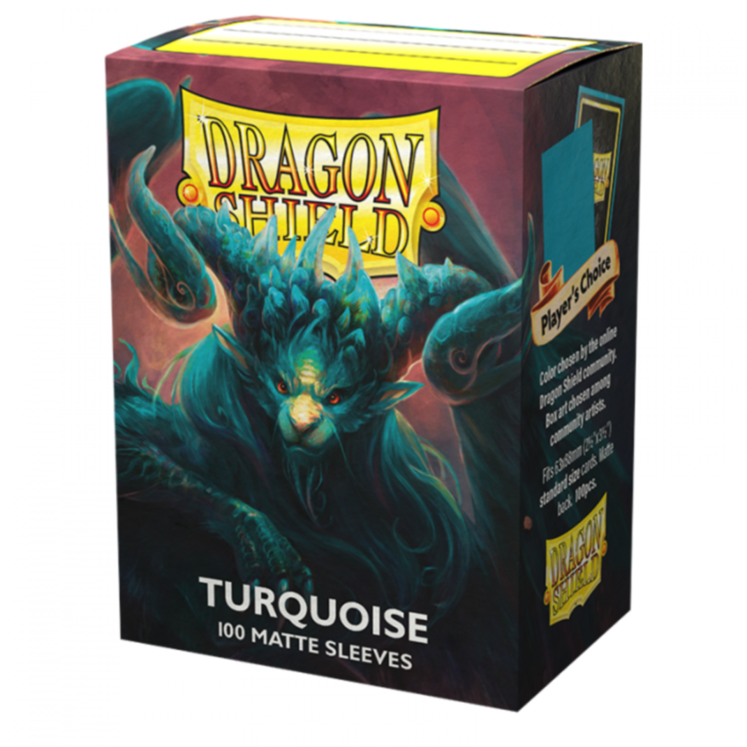 A box of 100 Dragon Shield Matte Turquoise standard size card sleeves showing the vibrant blue-green textured matte back and clear front.