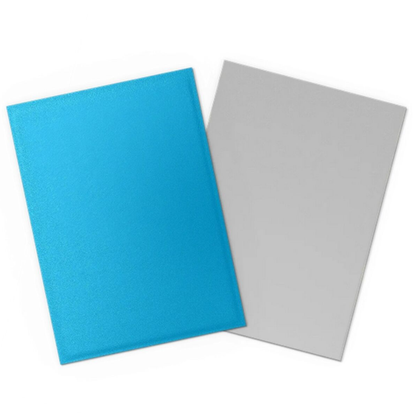 A close-up of a standard-sized card sleeved in a Matte Dual Sky Blue sleeve, demonstrating the opaque silver interior.