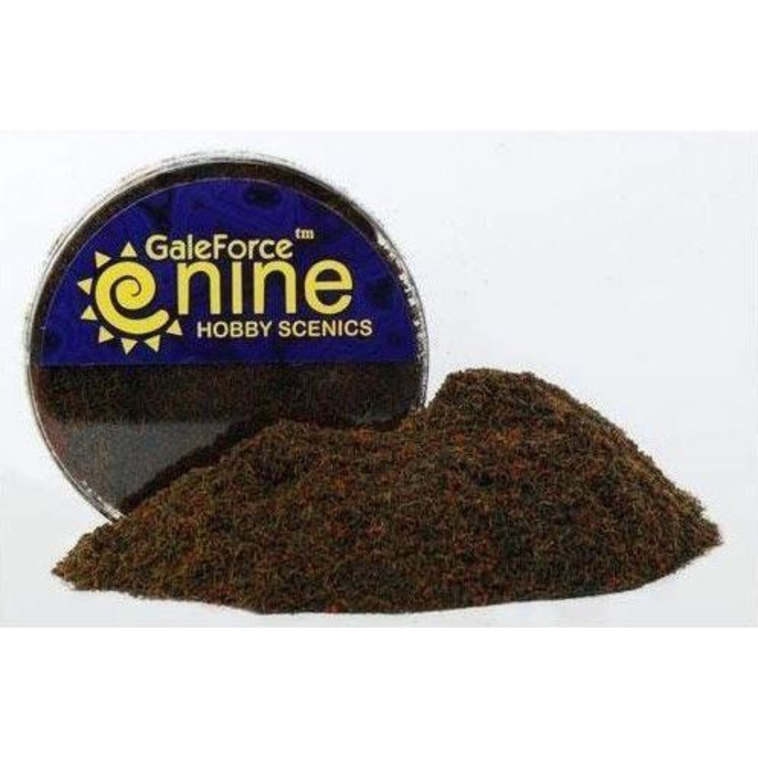 A container of Gale Force Nine Marsh Blend (GFS005) showing the dark green and brown flock used for realistic miniature swamp and wetland basing.