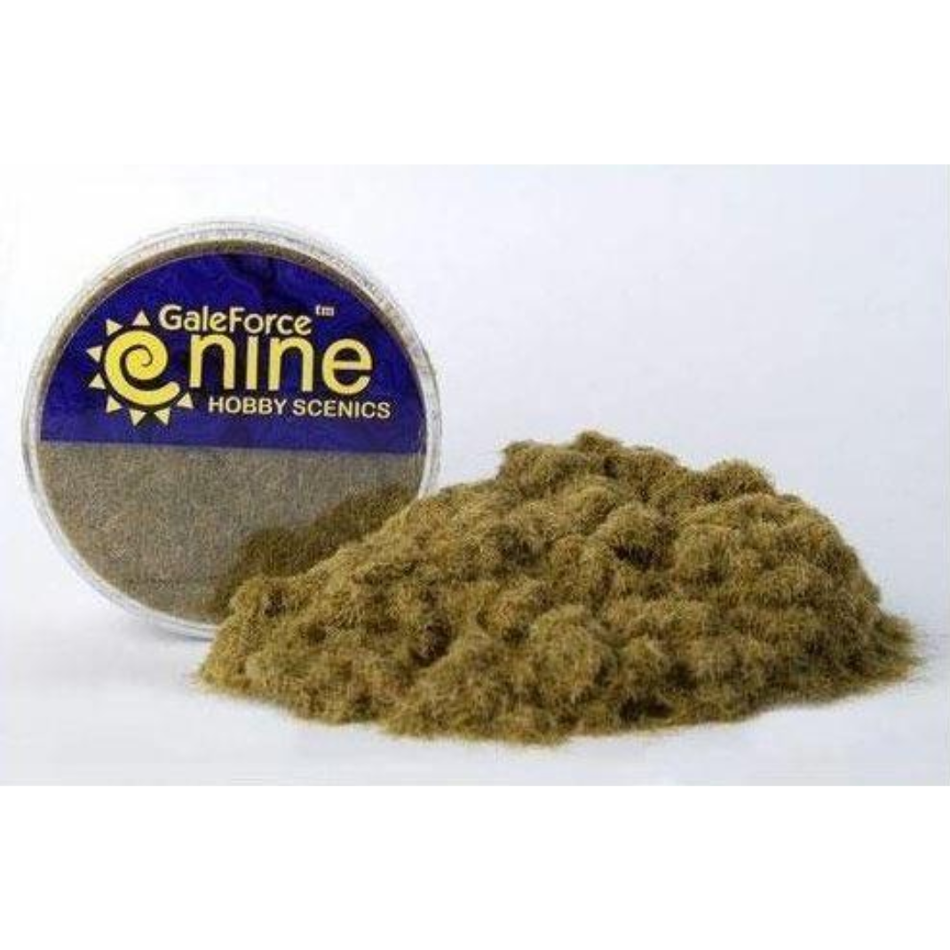A container of Gale Force Nine Winter/Dead Static Grass (GFS003) showing the pale straw and brown fibers used for realistic miniature basing and terrain.