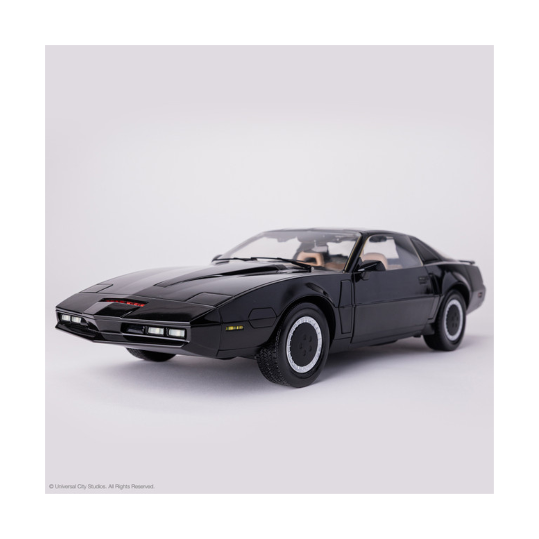 High-quality 1:10 scale replica model of the black Pontiac Trans Am K.I.T.T. from the television show Knight Rider, showing the illuminated red scanner light on the front grille.
