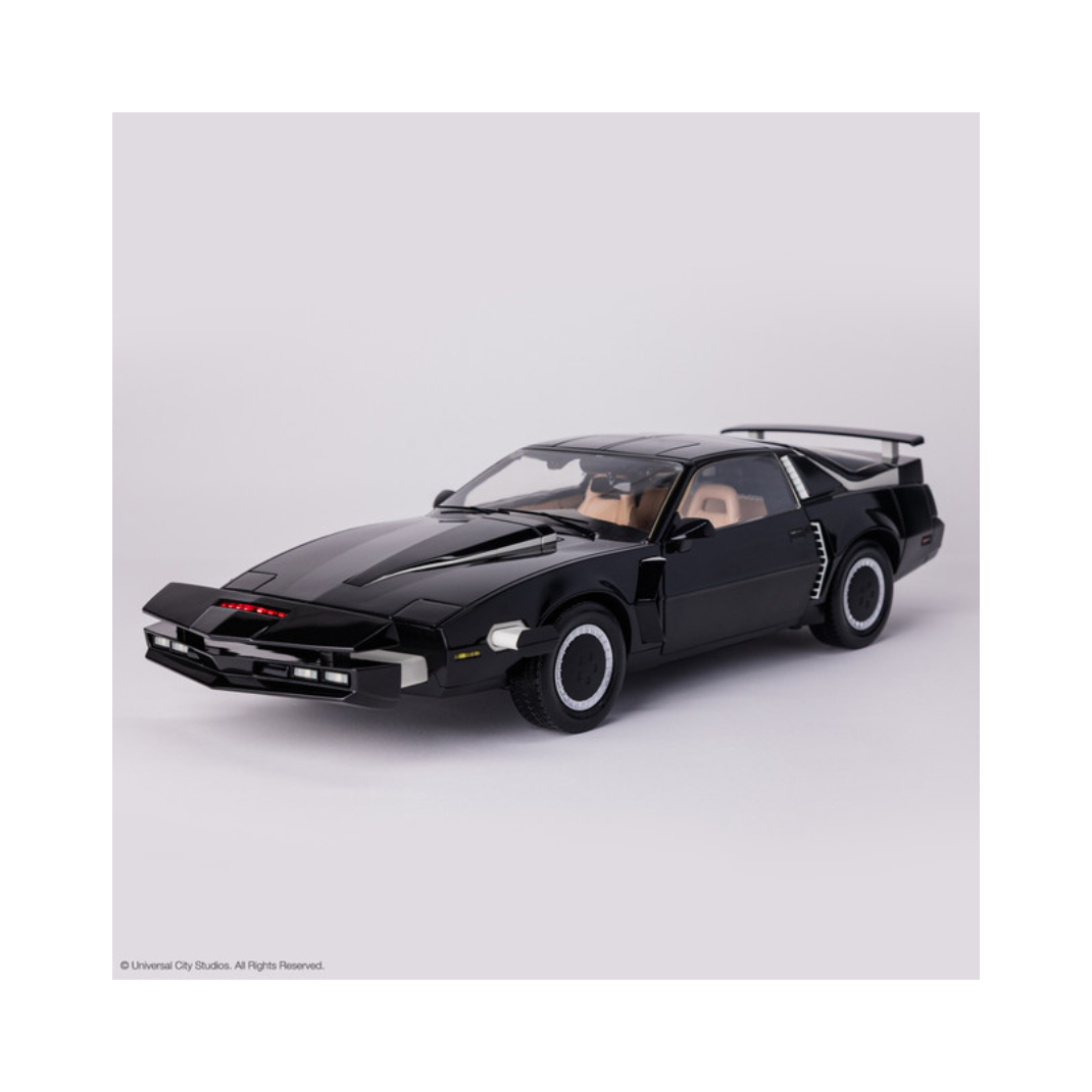 High-quality 1:10 scale replica model of the black Pontiac Trans Am K.I.T.T. from the television show Knight Rider, showing the illuminated red scanner light on the front grille.
