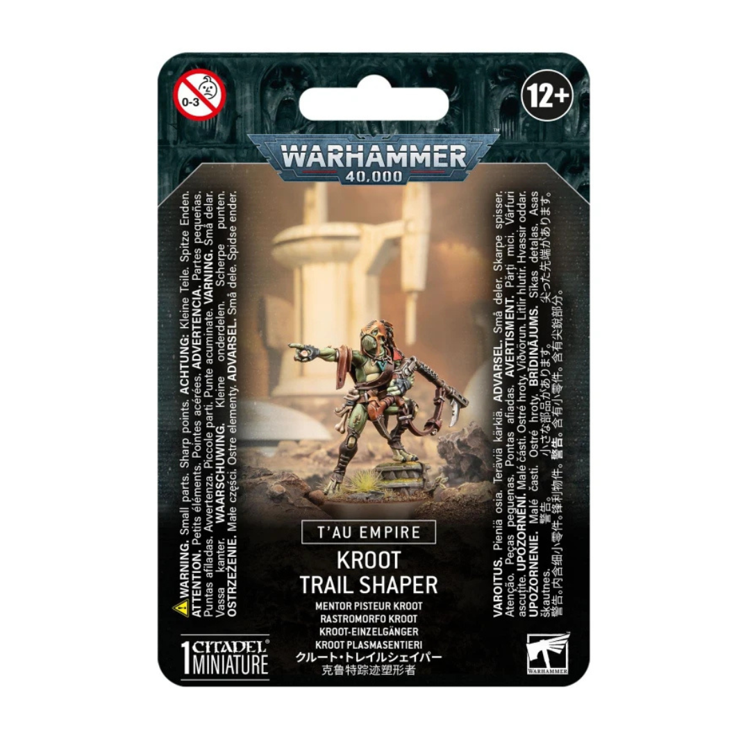 Warhammer 40,000 T’au Empire Kroot Trail Shaper miniature, showing a hooded Kroot leader with a rifle and hunting shawl in a scouting pose.