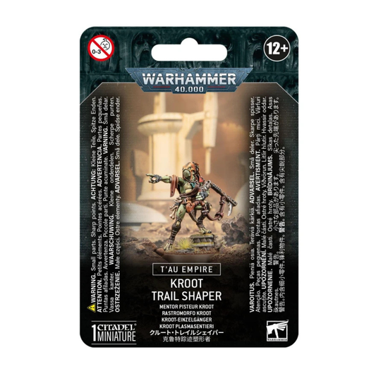 Warhammer 40,000 T’au Empire Kroot Trail Shaper miniature, showing a hooded Kroot leader with a rifle and hunting shawl in a scouting pose.