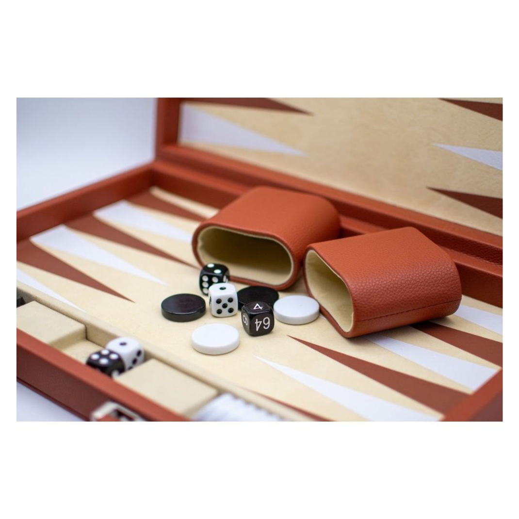An open LPG Classics brown leather backgammon attache case showing the internal playing field with white and brown points, chunky playing chips, and matching shakers.