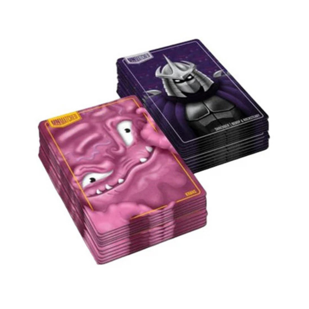The Unmatched Adventures: Teenage Mutant Ninja Turtles Shredder and Krang Hero Decks expansion box, showing the character cards and deck art for the two villains.