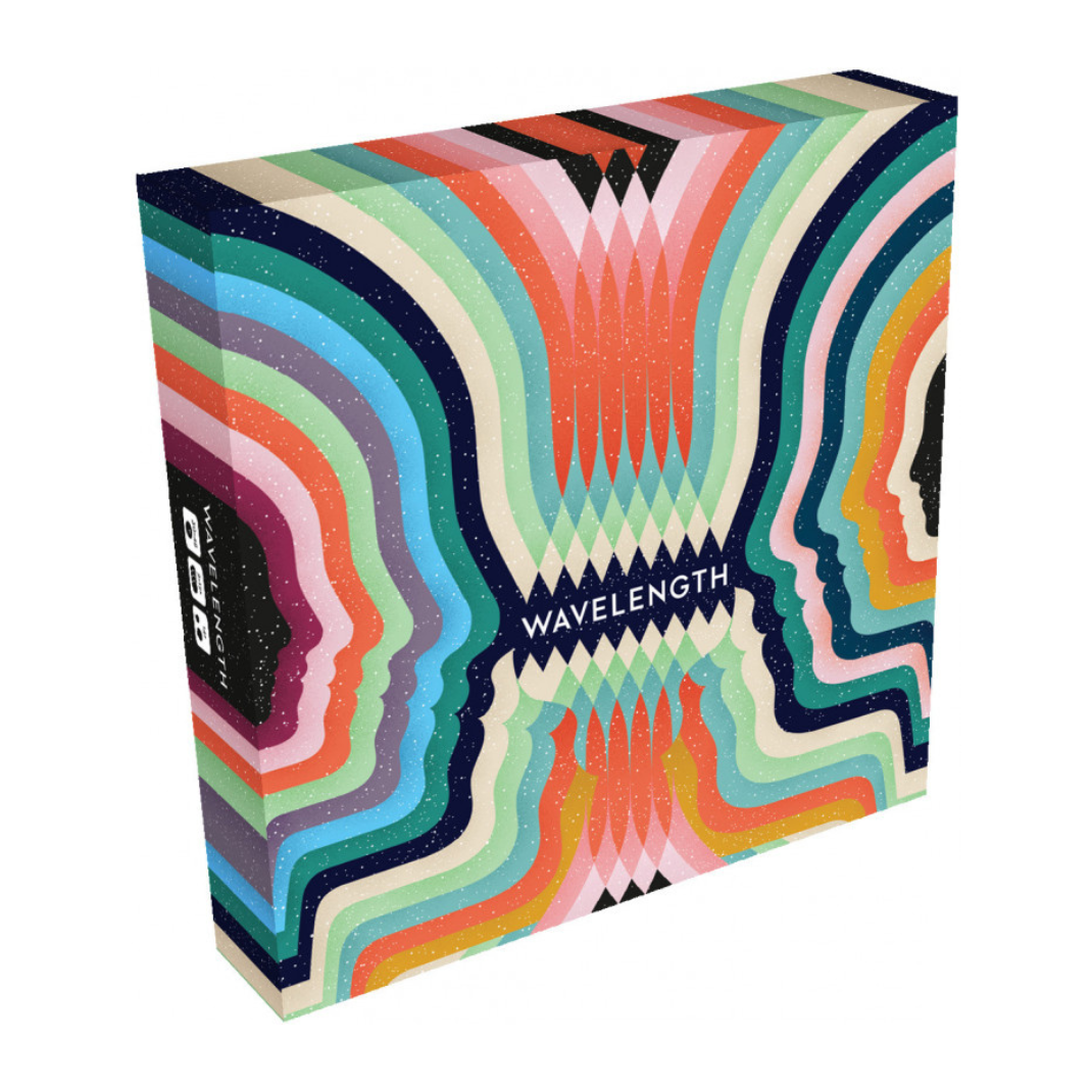 Wavelength board game box with dial device, clue cards, and team-based guessing gameplay.