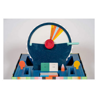 Wavelength board game box with dial device, clue cards, and team-based guessing gameplay.