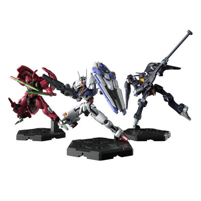Gundam Assemble Expansion Pack 02 EX02 miniature figures: a crimson mobile suit, a white and blue Gundam and a dark armoured mobile suit on hex bases
